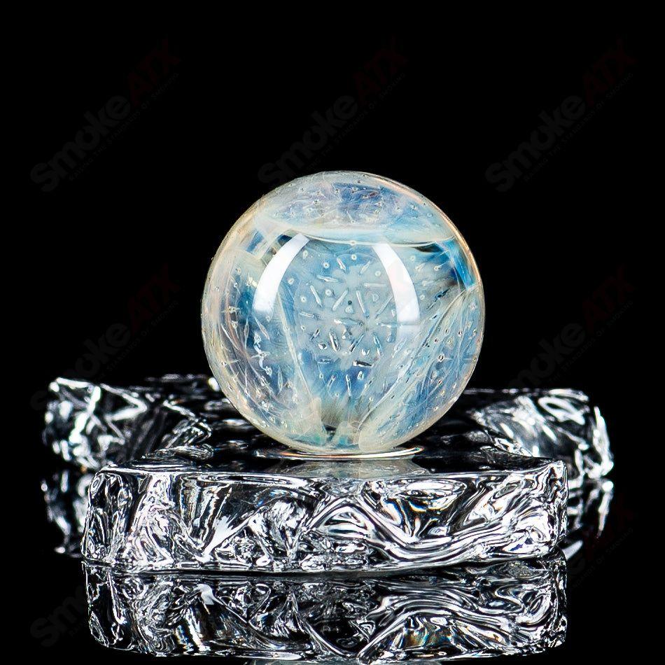 Faceted Ghost Marble with Trefoil S.O.L. pattern by Fatal Facets, detailed heady glass art with intricate design and vibrant colors.