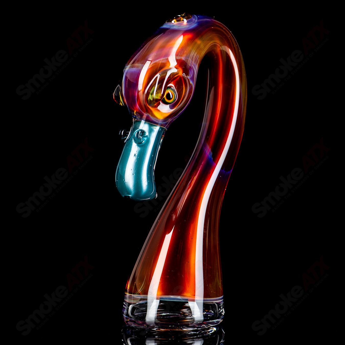 Flamingo-shaped Puffco dry top by Burtoni Glass, crafted from clear glass with detailed flamingo design for Puffco devices.