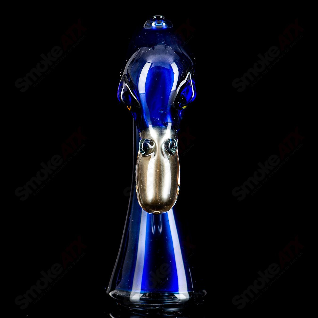 Flamingo-shaped Puffco dry top made of Burtoni Glass, designed for Puffco atomizers, with vibrant pink and clear glass details.