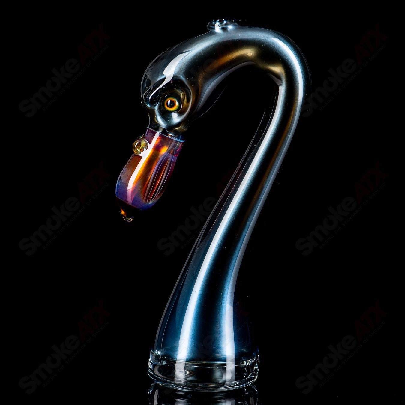 Flamingo-shaped Puffco Dry Top by Burtoni Glass, crafted from clear glass with colorful flamingo design.