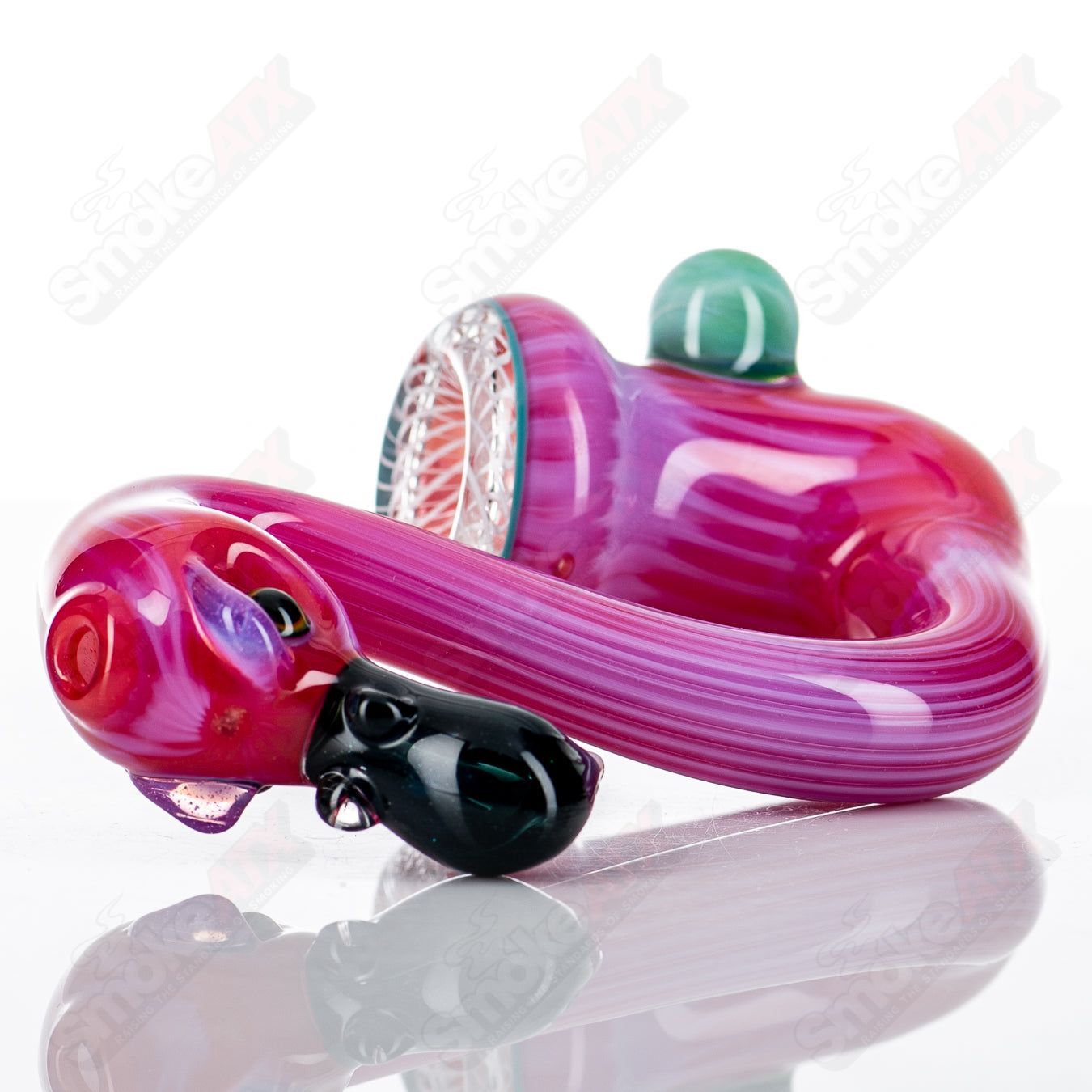 Colorful Flamingo Sherlock Burtoni Glass heady glass with intricate design and clear glass accents, perfect for display or use.