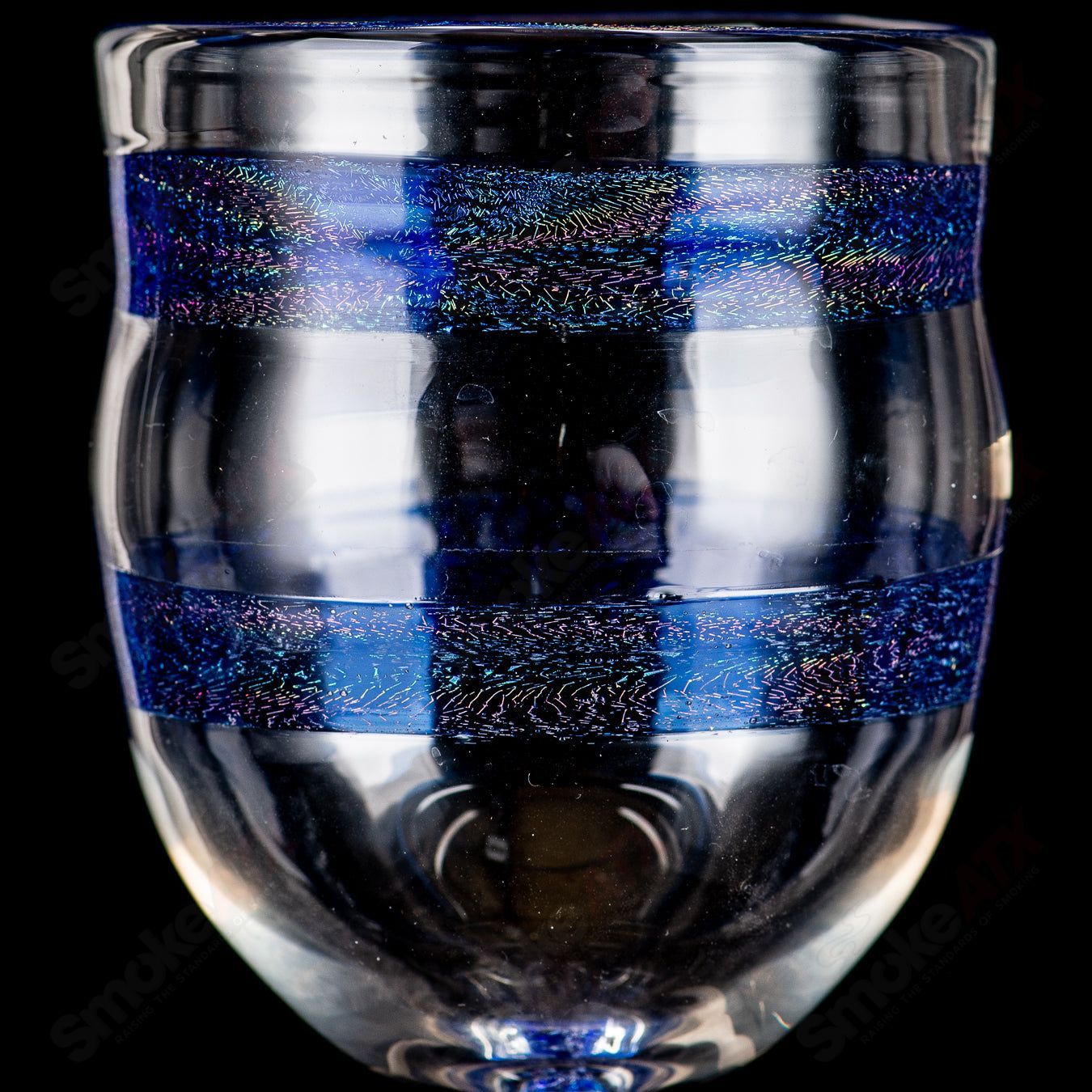 Blue dichro spiral stem drinking goblet with footed design from Drinking Vessels, made of heady glass, features vibrant color and intricate pattern.