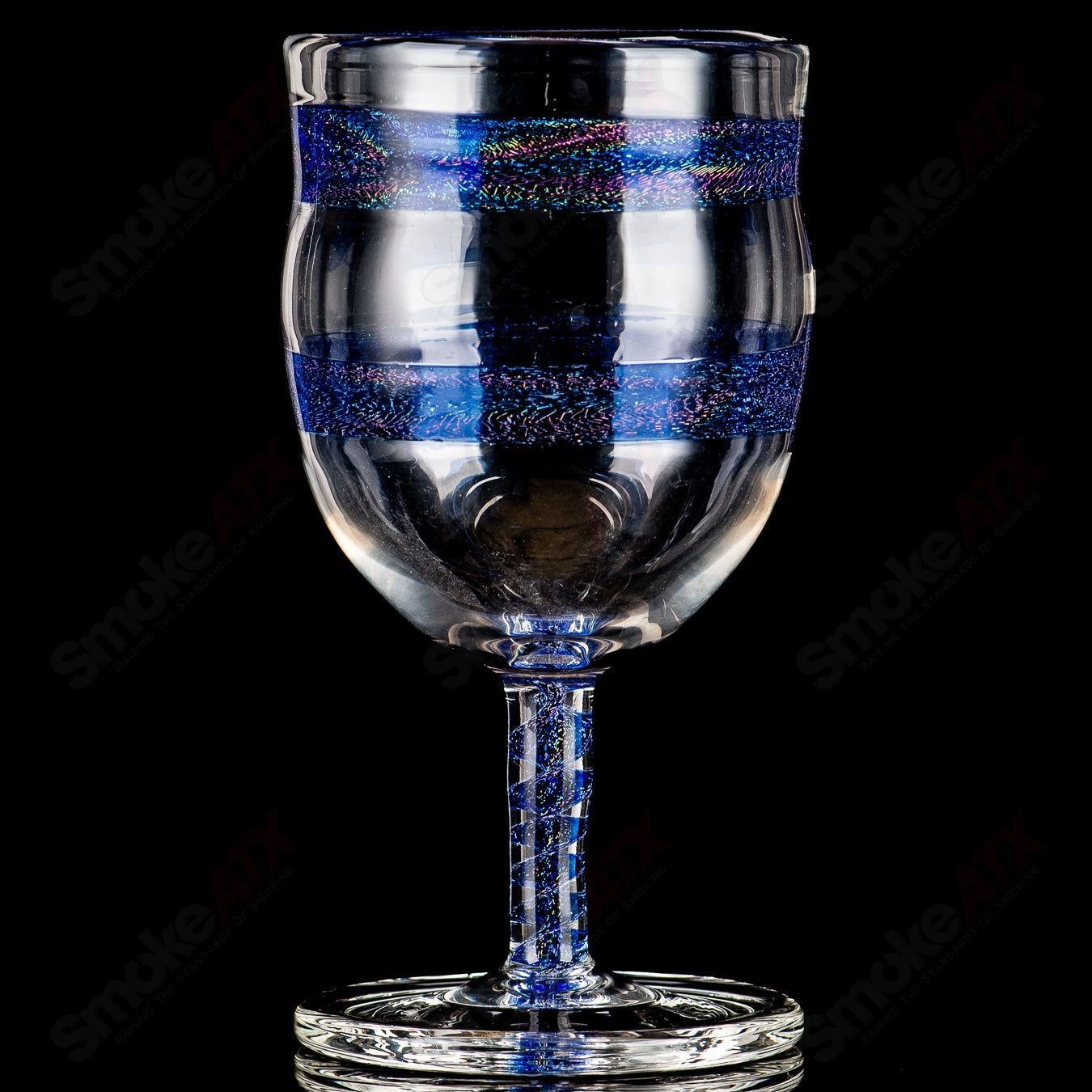 Blue dichro spiral stem footed goblet by Drinking Vessels, colorful heady glass cup with a decorative foot and intricate spiral design.