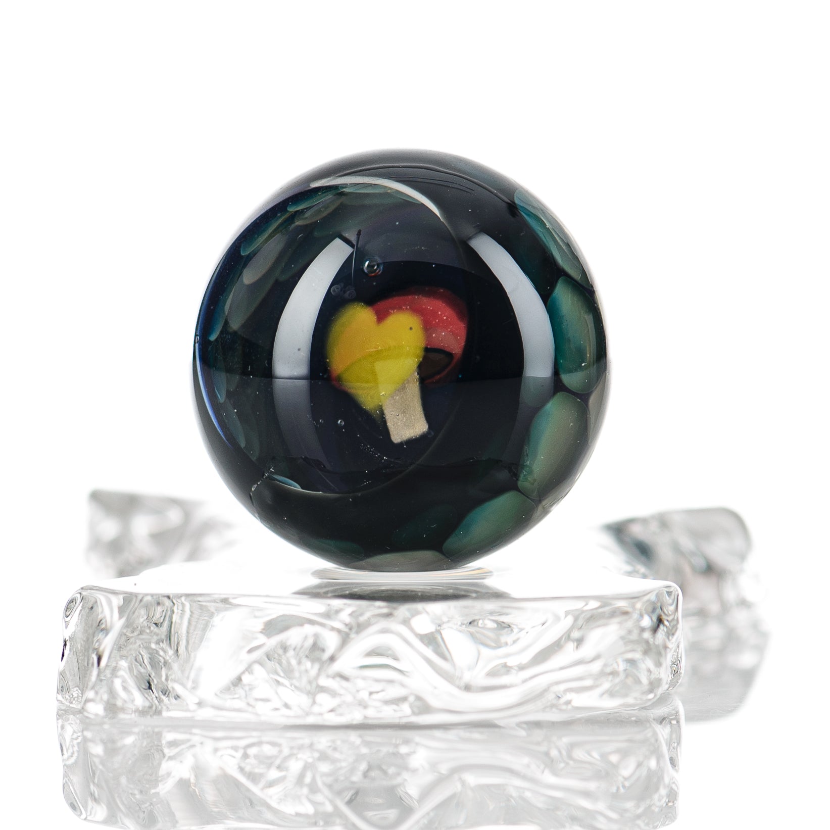 Clear marble Flex Glass #2 with a smooth, rounded surface showcasing its transparent, glossy marble design.