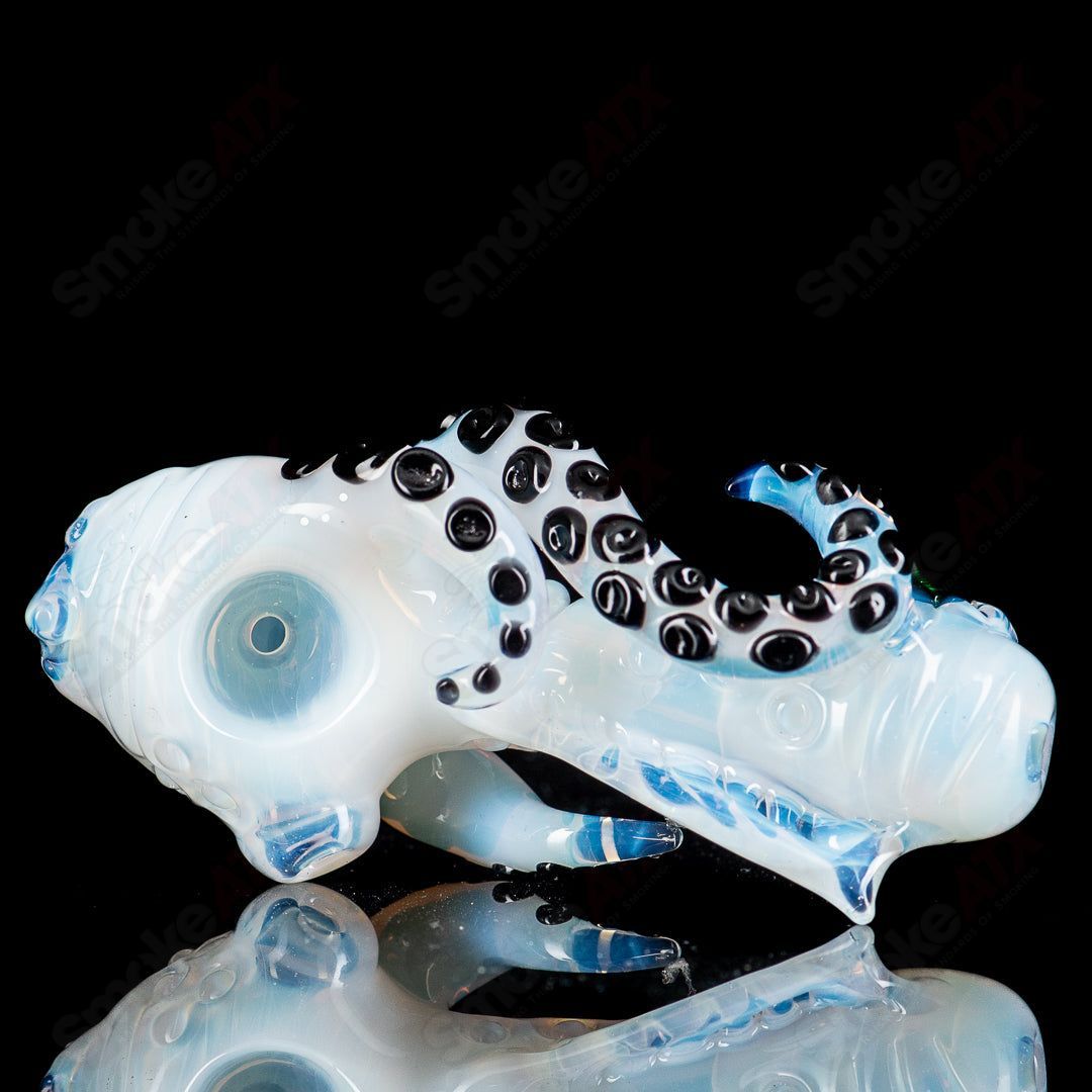 Mako Glass #6 Seamonster Spoon hand pipe with detailed sea creature design in vibrant colors, made of clear and blue glass.