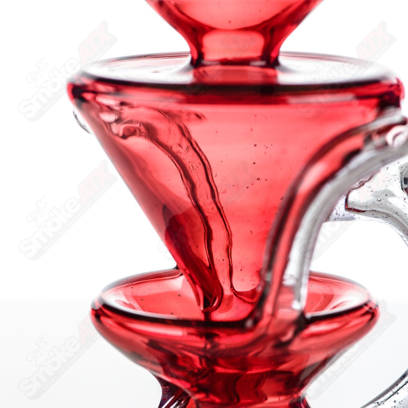 Full-size CFL Recycler by Captn Chronic, heady glass recycler with intricate design and clear glass construction.