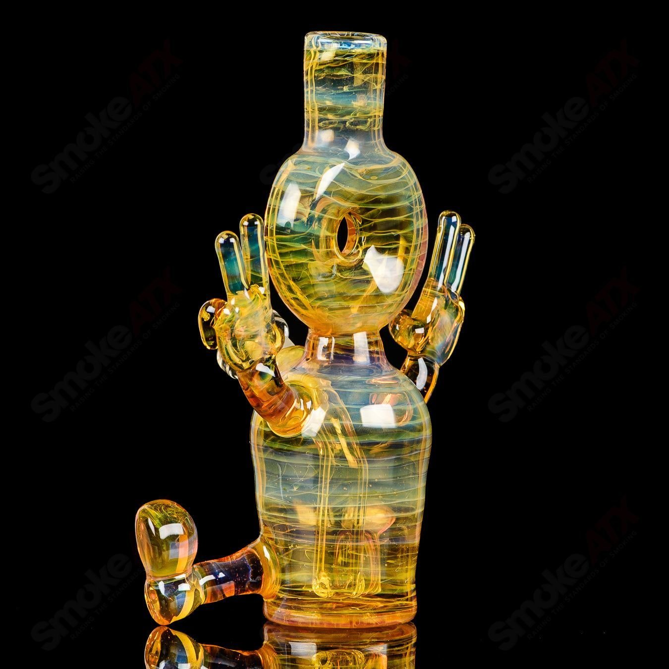 Fumed Sitter Rig by MJ Meltz, a heady glass concentrate rig with swirling fumed glass details and a stable sitter design.