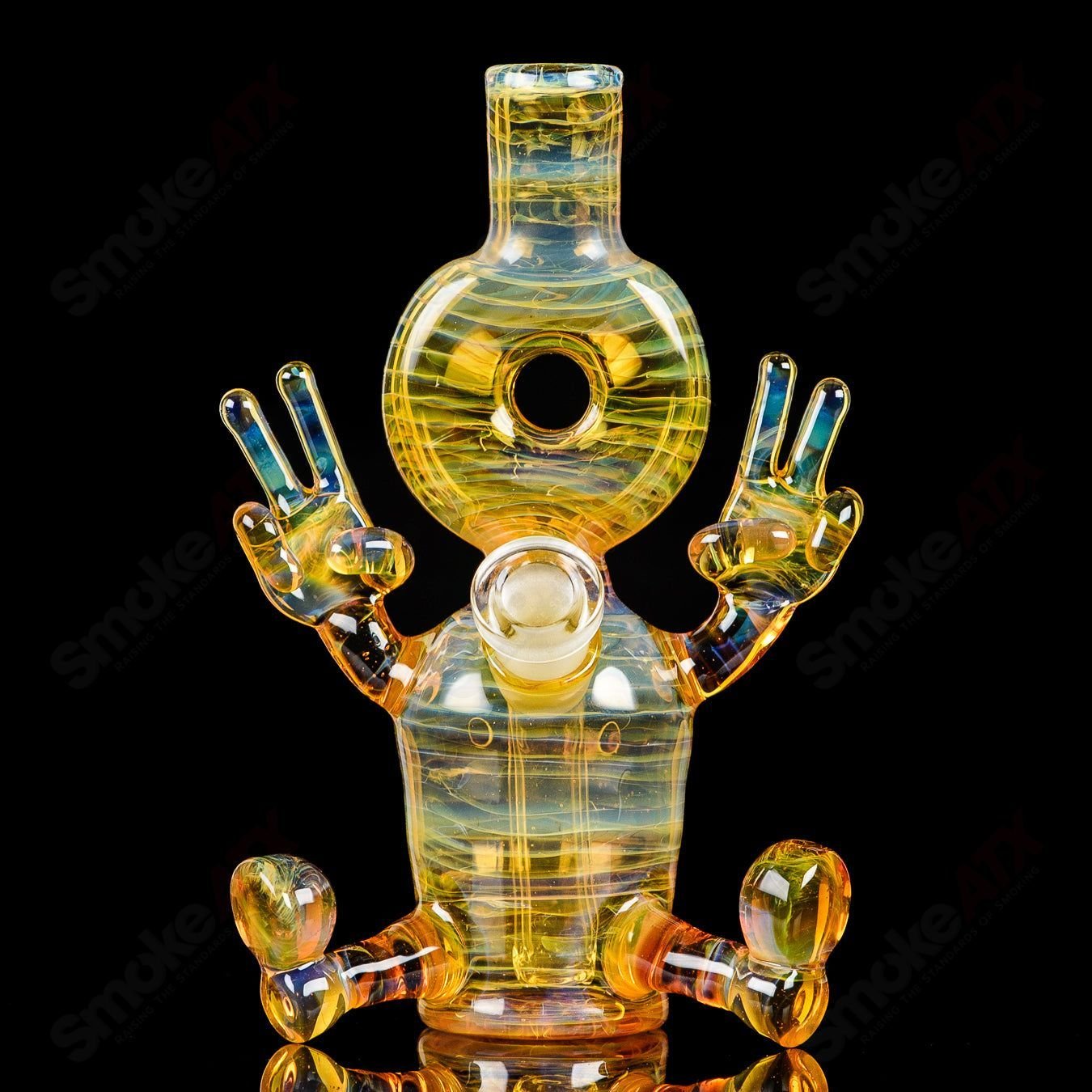 Fumed Sitter Rig by MJ Meltz, a sleek heady glass concentrate rig with swirling fumed details and a stable sitting design.