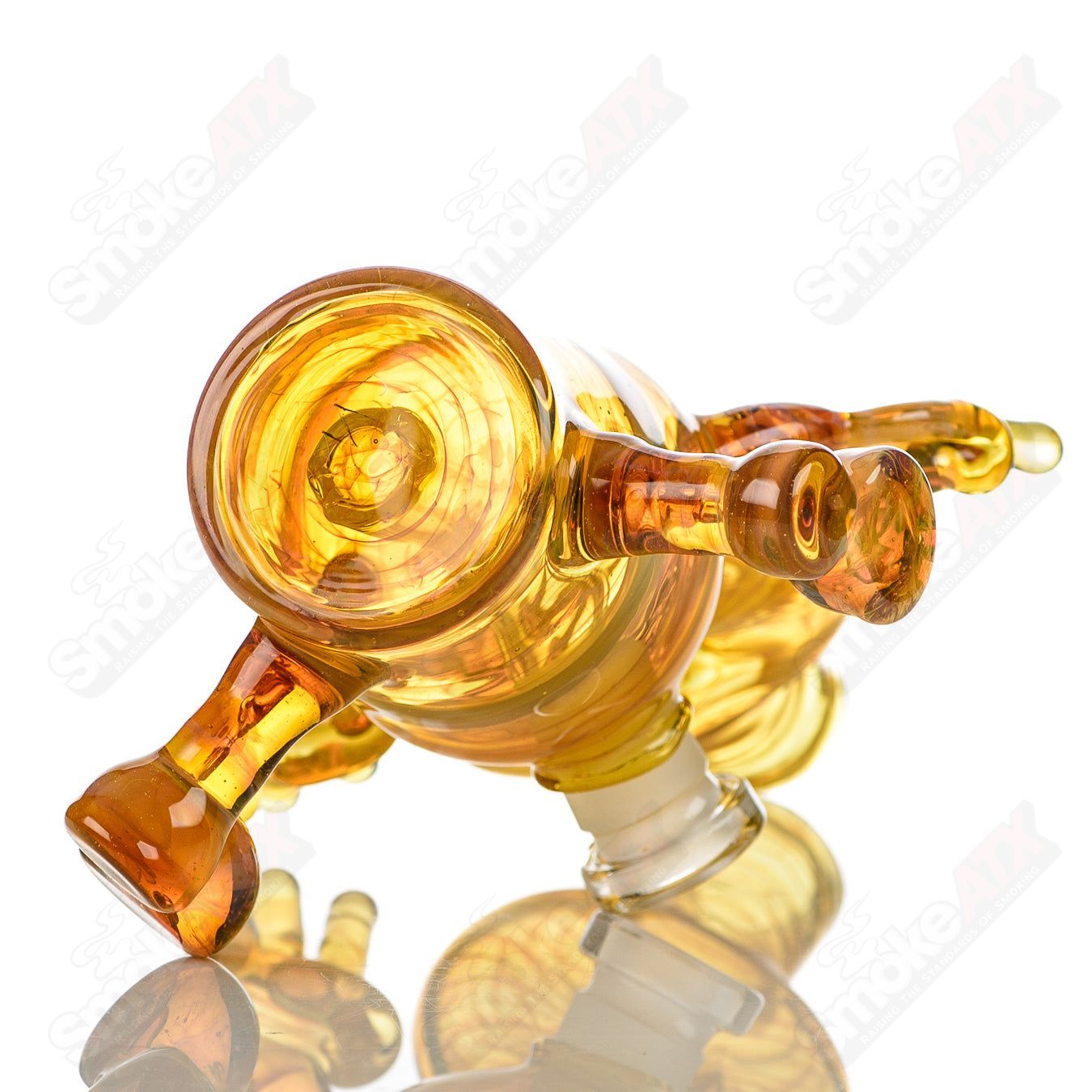 Fumed Sitter Rig by MJ Meltz, heady glass concentrate rig with swirling fumed details and a sturdy sitting design.