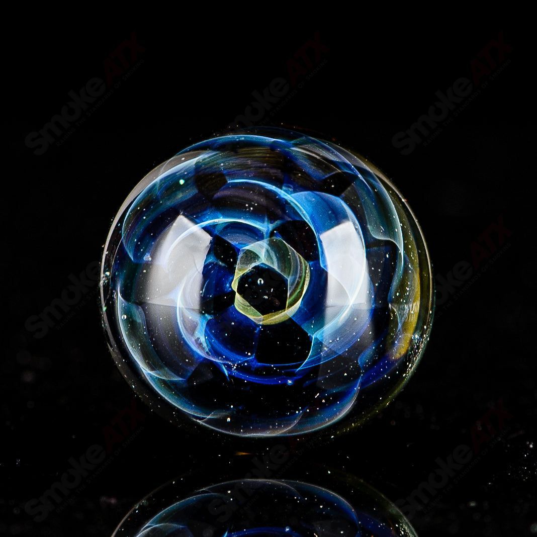 Indo Glass Galactic Spike Topper glass carb cap with a celestial design, perfect for vaporizer accessories.