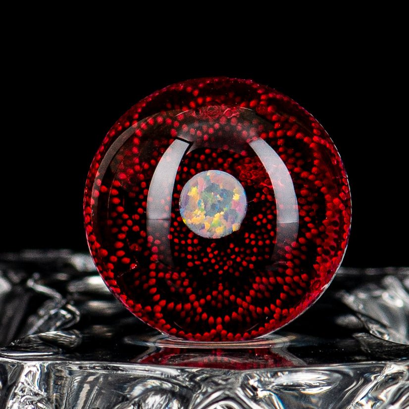 Geometric Slurper marble by JH Glassworks, featuring colorful geometric patterns and smooth glass surface.