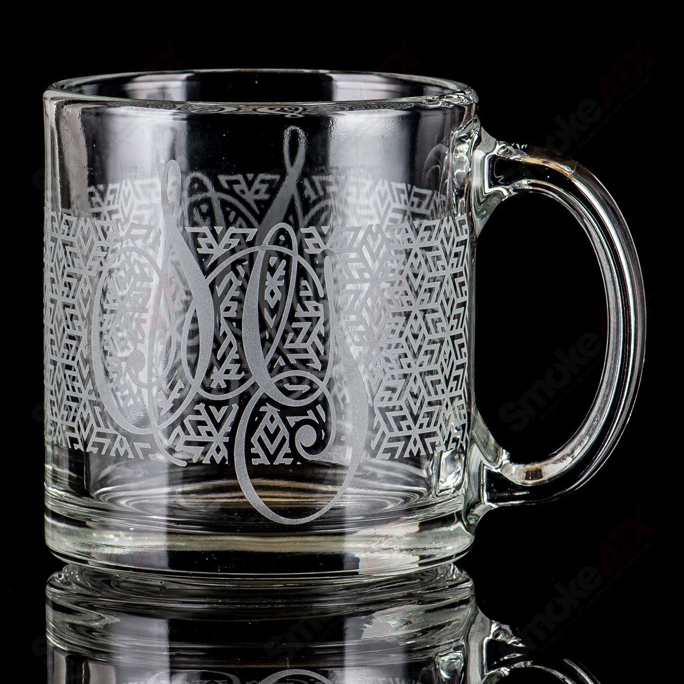 Clear glass coffee mug with Tri-Stars pattern from Sovereignty Glass, featuring a sturdy handle and smooth finish.
