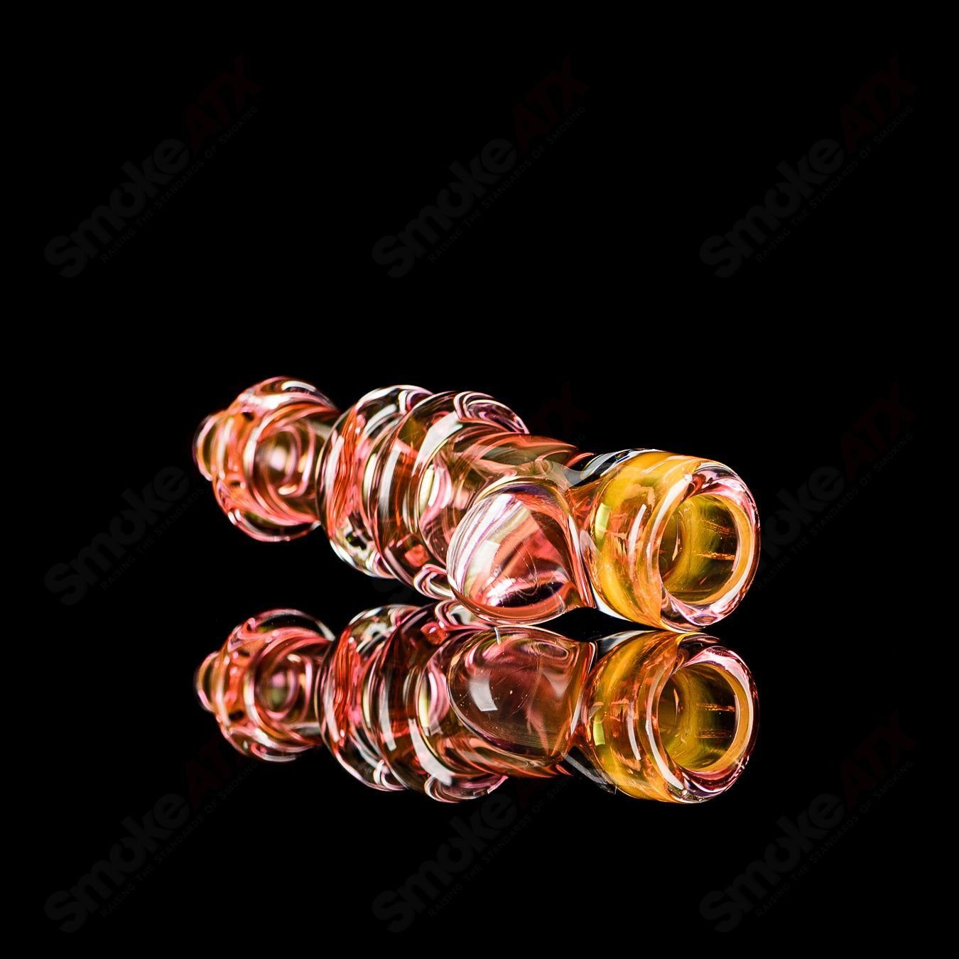 Gold fumed triple Maria chillum with clear dot design by JMK Glass, showcasing intricate glasswork and signature detailing.