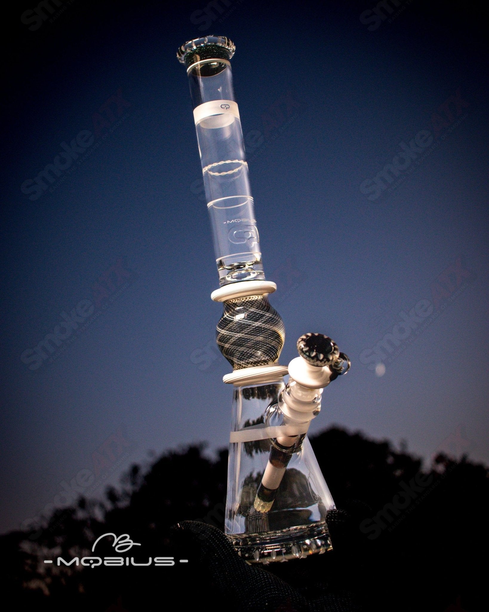 Mobius GRB 16 Circle Solo signed glass beaker with #11 of 2024 inscription, clear and detailed design.