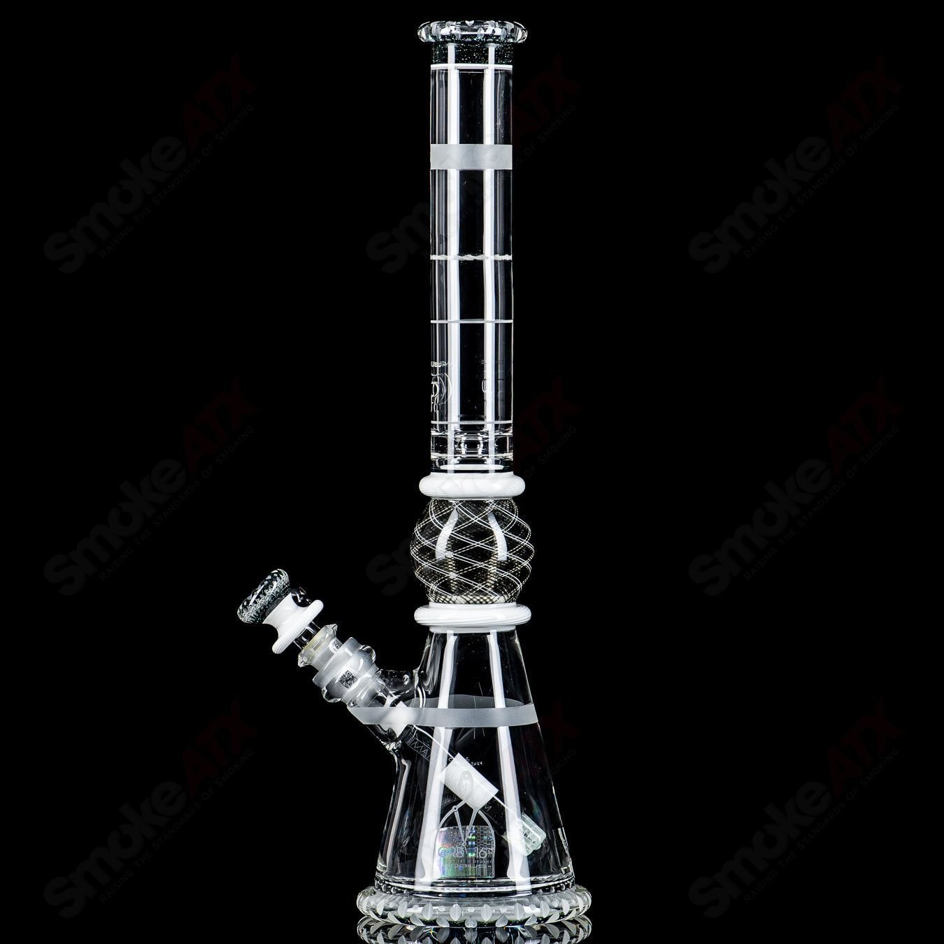 Mobius GRB 16 Circle Solo signed glass beaker with #11 of 2024 inscription, clear cylindrical laboratory glassware.