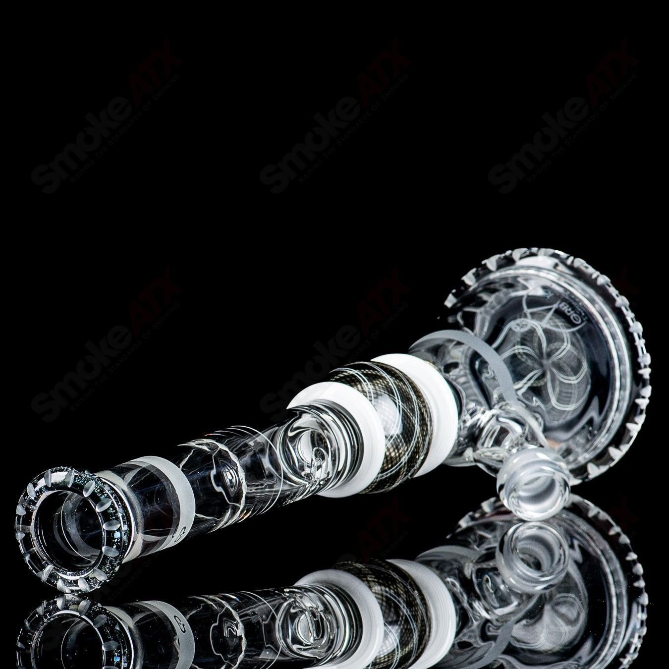 Glass beaker from Mobius, GRB 16 circle solo signed, #11 of 2024, with clear glass and detailed markings.