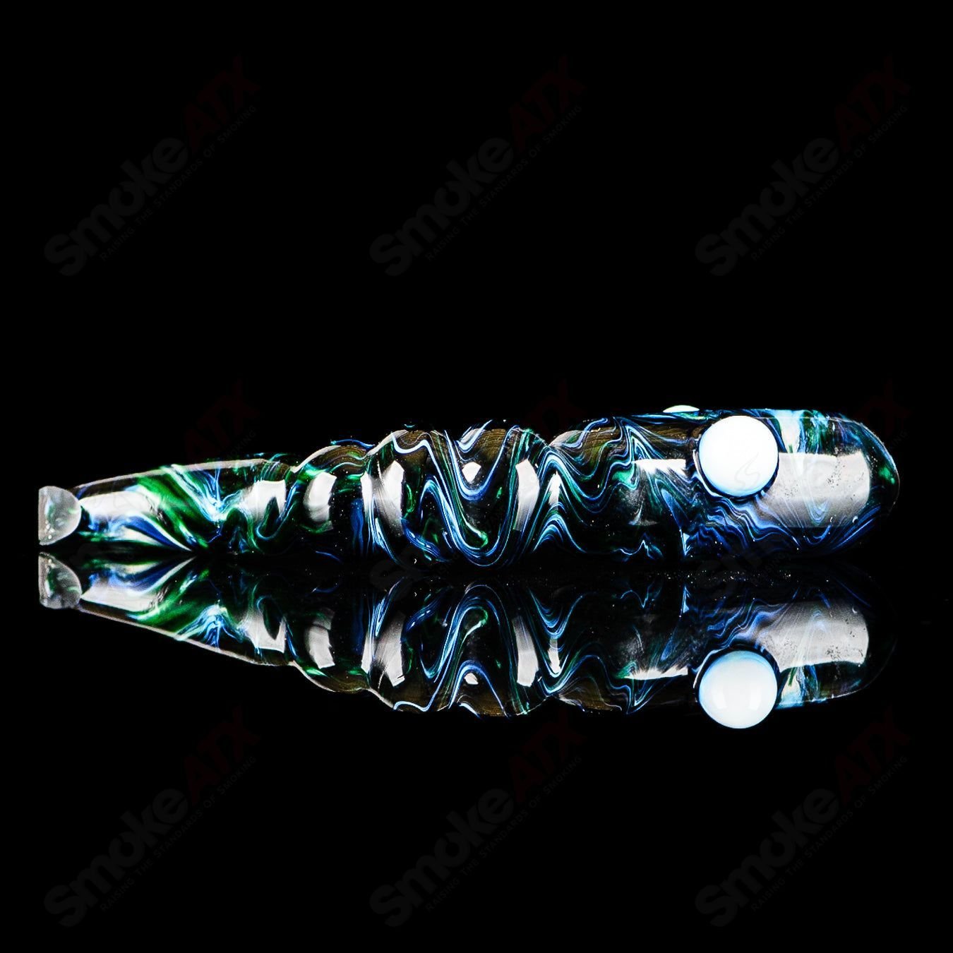 Green apple-shaped rig with a worm dabber pouch from Pouch Glass, designed for concentrate use in heady glass style.