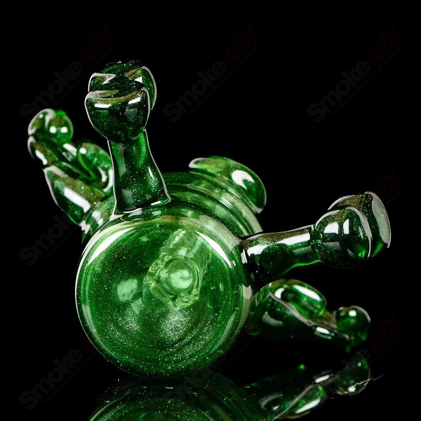Green Sitter Tube with Pendant from MJ Meltz, heady glass concentrate rig featuring a vibrant green design and decorative pendant.