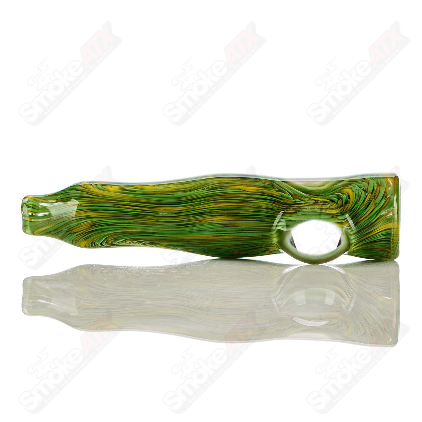Green and yellow worked glass chillum with clear dot signature from JMK Glass, showcasing intricate color and design details.