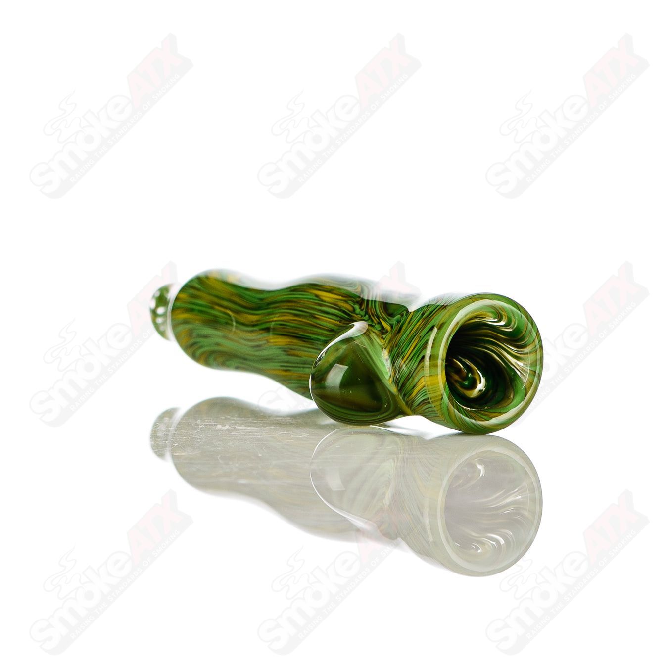 Green and yellow worked glass chillum with clear dot signature from JMK Glass, showcasing intricate color work and craftsmanship.