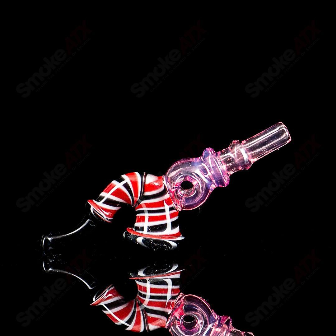 JMass Sherlock Toggle glass pipe with 3DXL design, featuring a detailed, artistic pattern in clear glass.