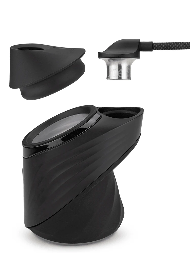 Puffco Peak Pro Link Puffco e-rig accessory with intricate design, used for enhancing vapor experience and portable dabbing.