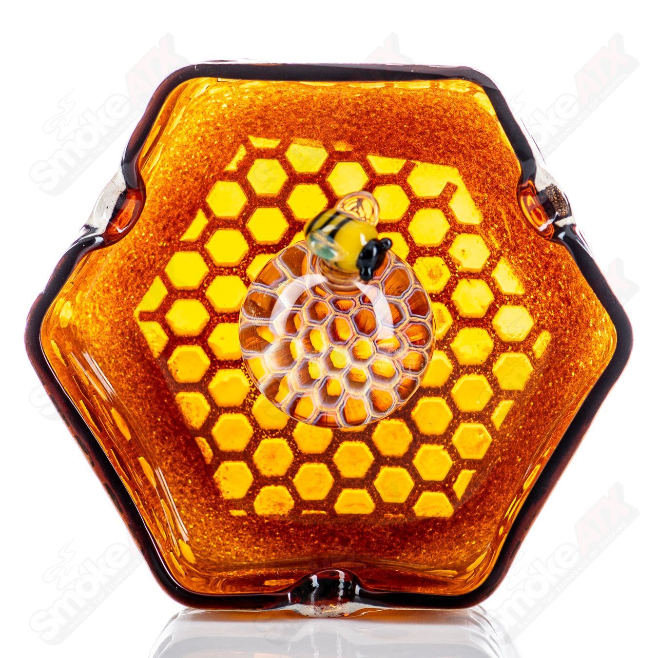 Honeycomb glass ashtray by Joe P with a textured honeycomb design, ideal for 420 enthusiasts and stylish smoking accessories.
