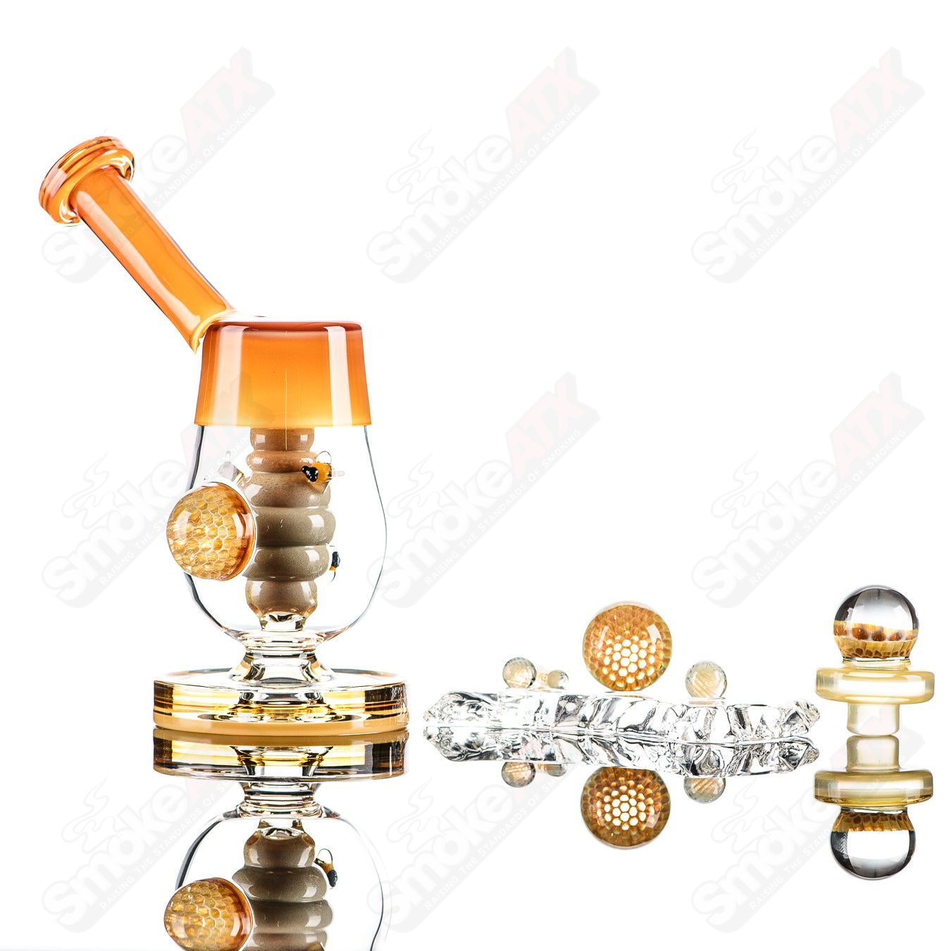 Joe P Glass honeycomb jammer set, heady glass bubbler with intricate honeycomb design, clear glass construction, and compact size.