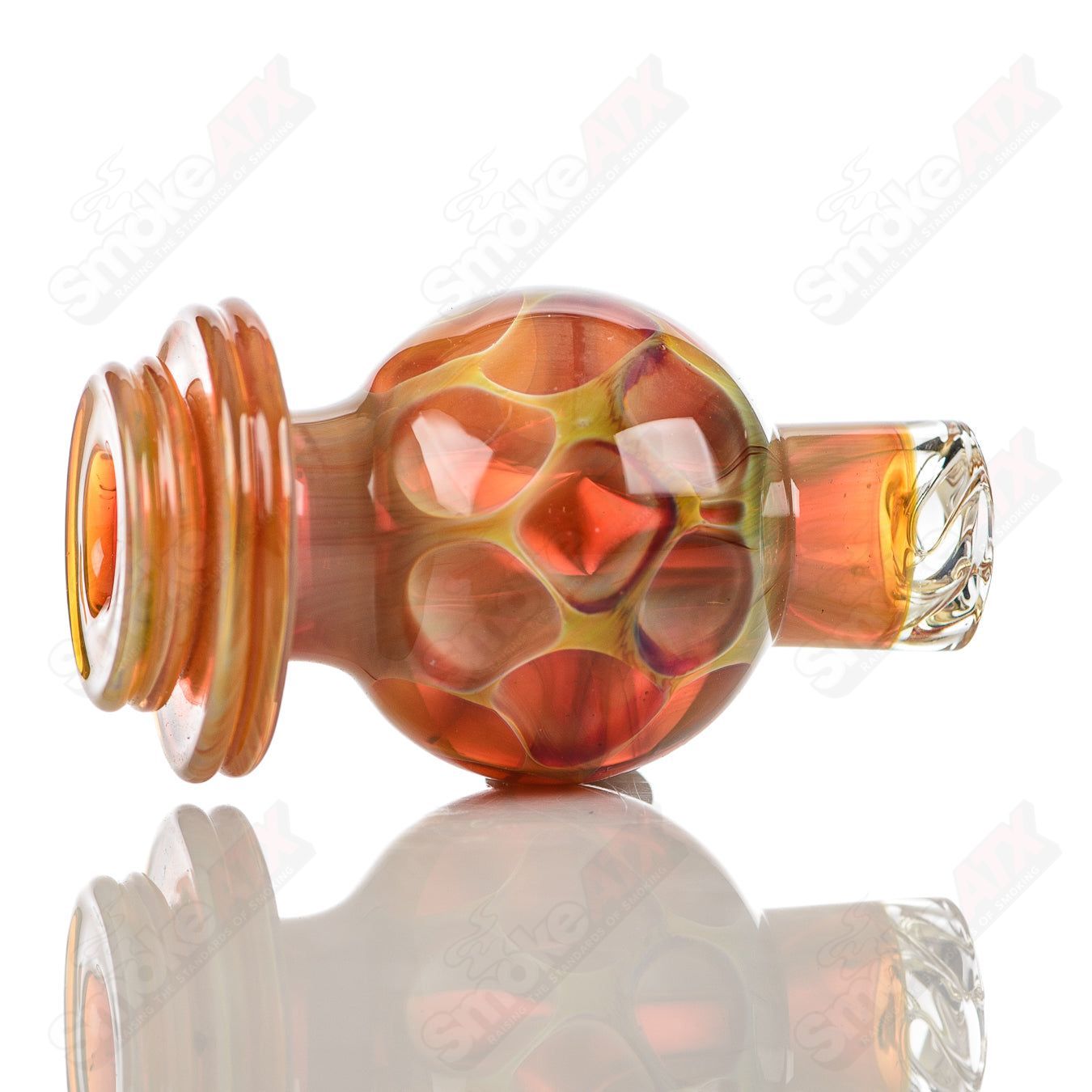 Glass Carpenter honeycomb spinner cap, a clear glass tool with a honeycomb pattern for carpentry and craft projects.