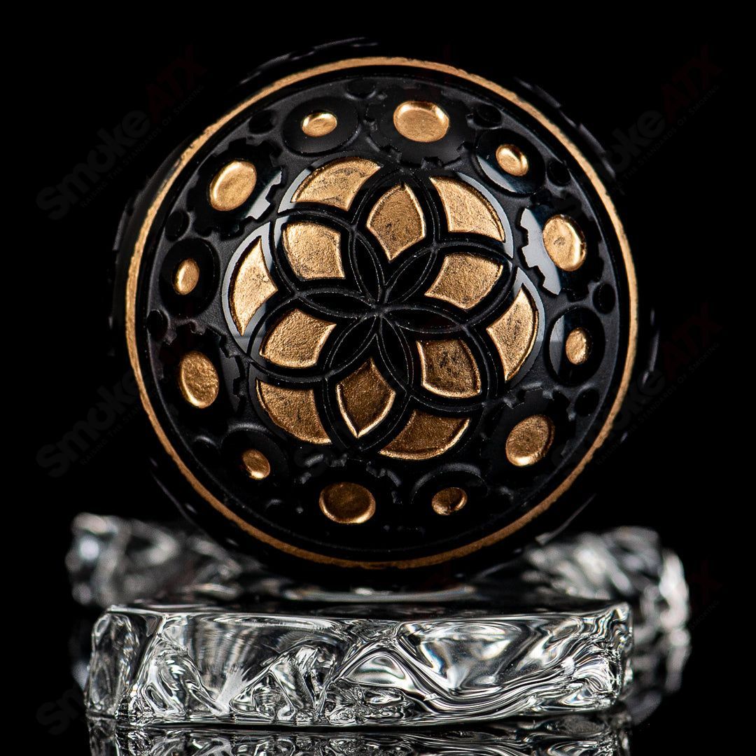 Fatal Facets Battuto black marble heady glass marbles with intricate patterns and glossy finish, perfect for decorative display or collection.
