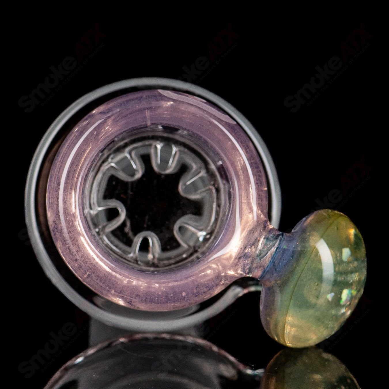 Mobius Ion Matrix Shifty Peach over Icy White V1 glass waterpipe with colorful accents and intricate design.