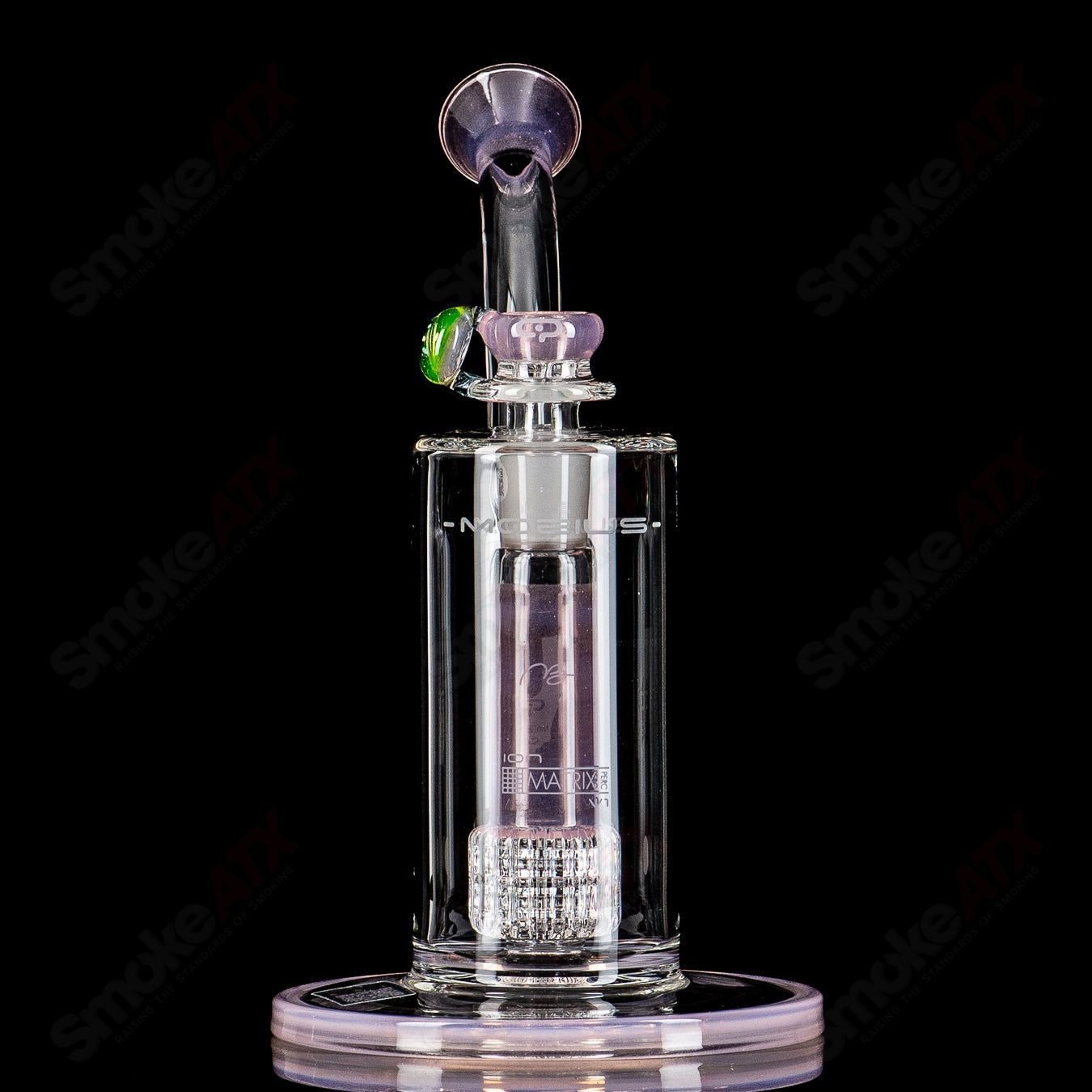 Mobius Ion Matrix Shifty Peach over Icy White waterpipe glass with V1 accents, featuring a sleek, artistic design.