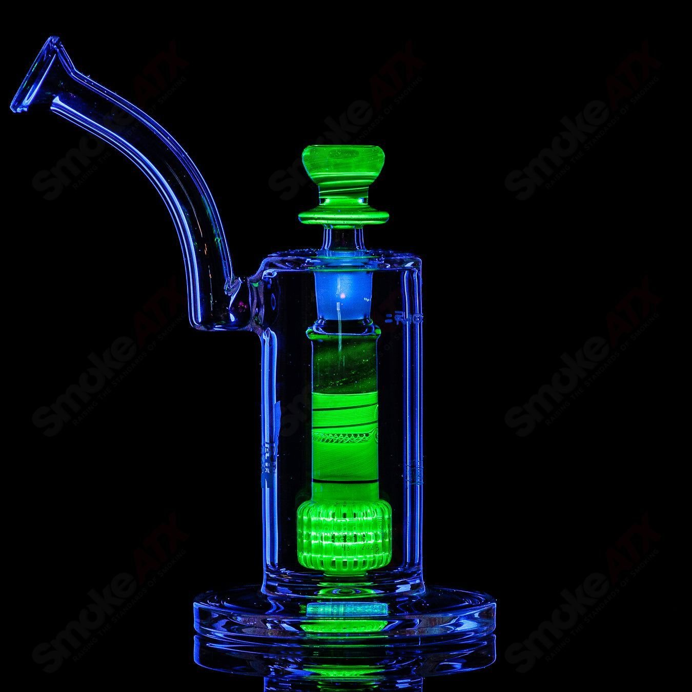 Mobius Ion Matrix V1 Accent Series glass bubbler with intricate design and clear glass construction.
