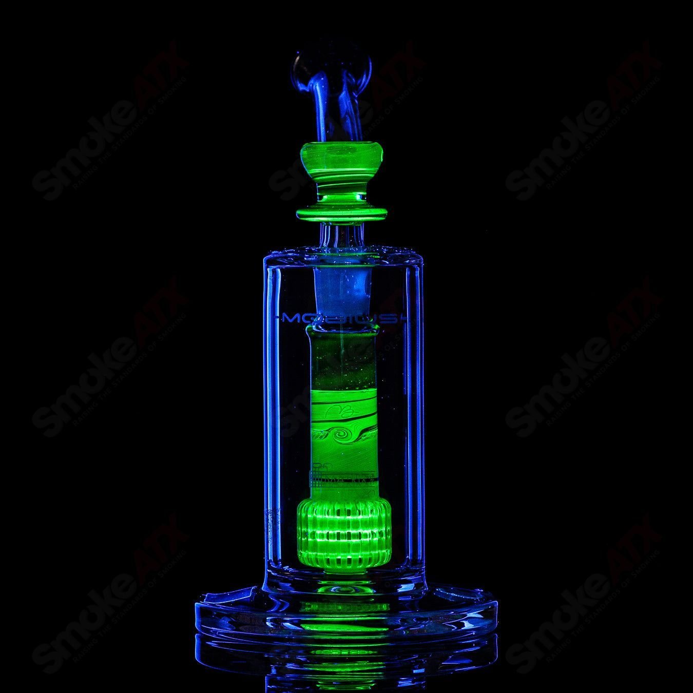 Mobius Ion Matrix V1 Accent Series glass bubbler with intricate design and clear glass body, showcasing artistic craftsmanship.