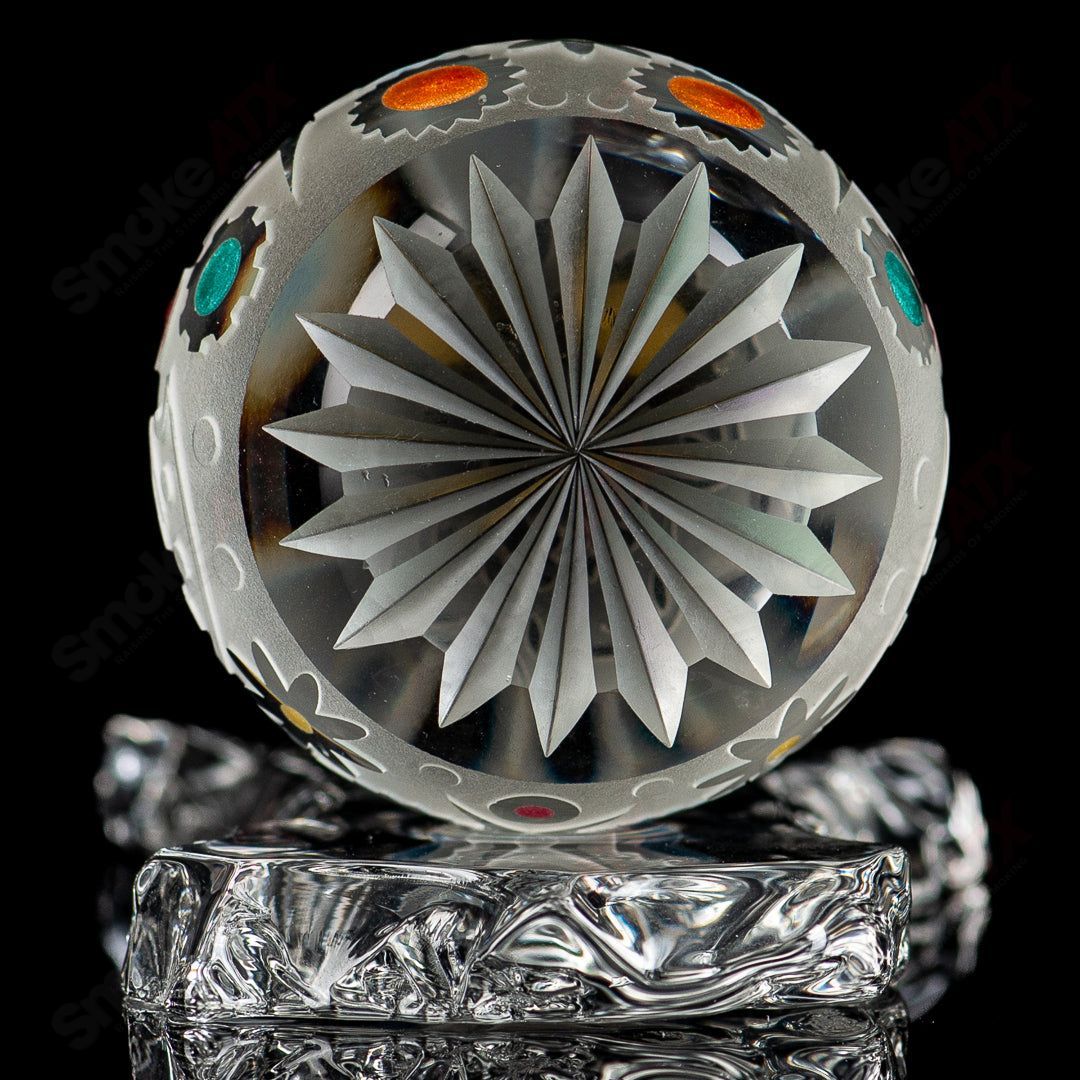 Faceted Skull Marble by Fatal Facets, Heady Glass marble featuring a detailed skull design with colorful faceted glass surface.