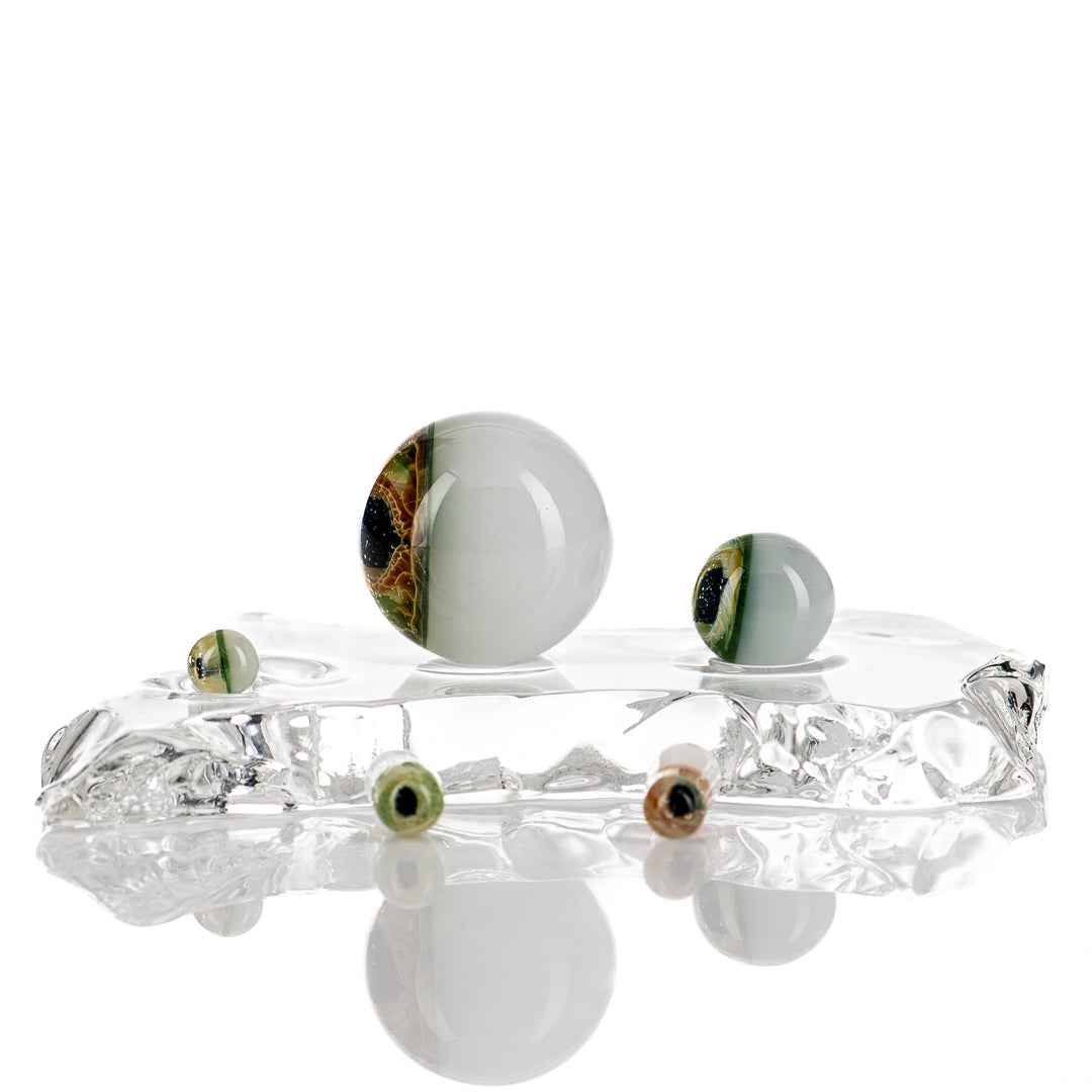 Indo Glass Dragon Eye Slurper Set featuring colorful glass pieces with dragon eye design for smoking accessories.