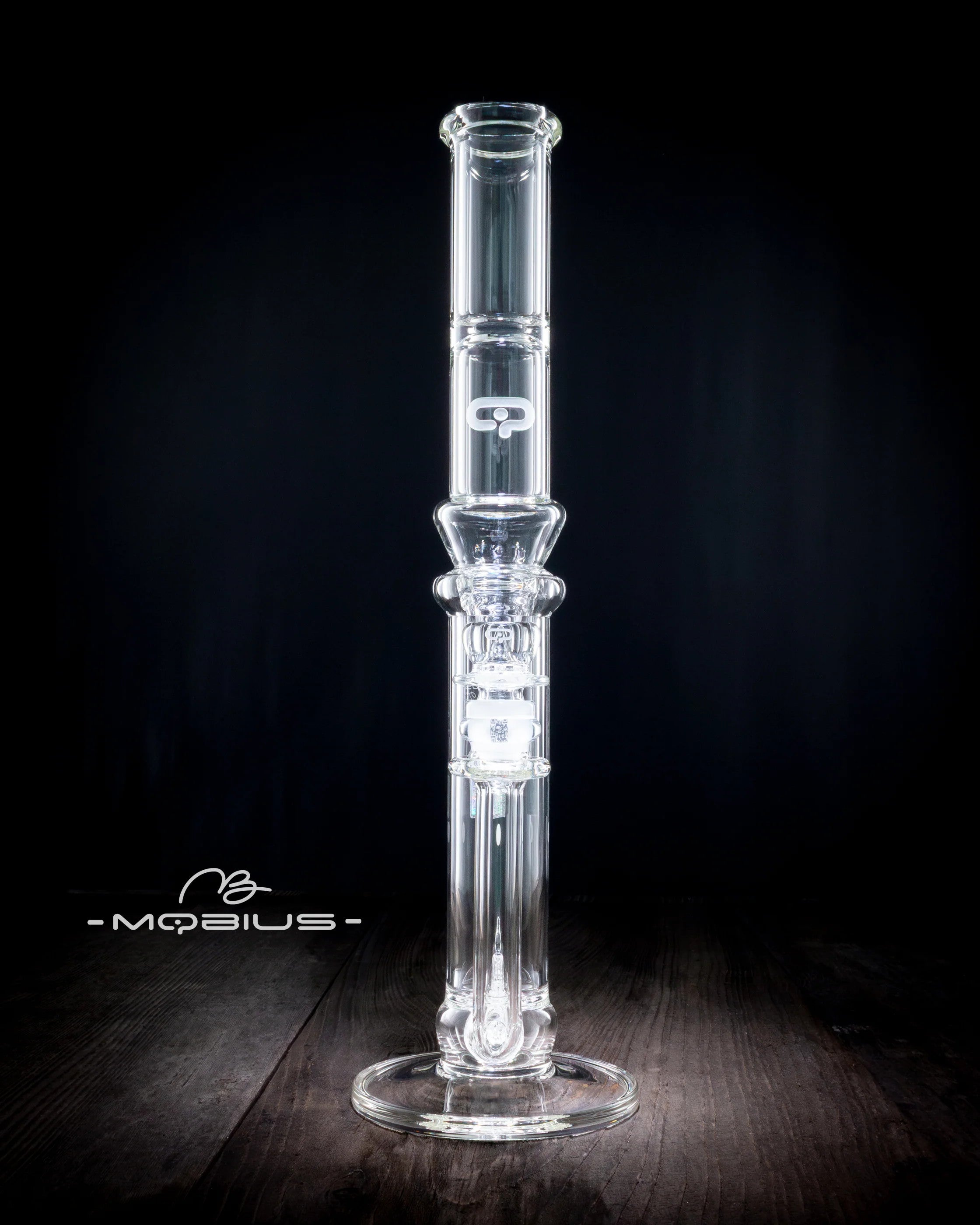 Mobius 45T Tall Stereo Matrix Splash Trap V1 glass waterpipe with clear water chamber and intricate design.