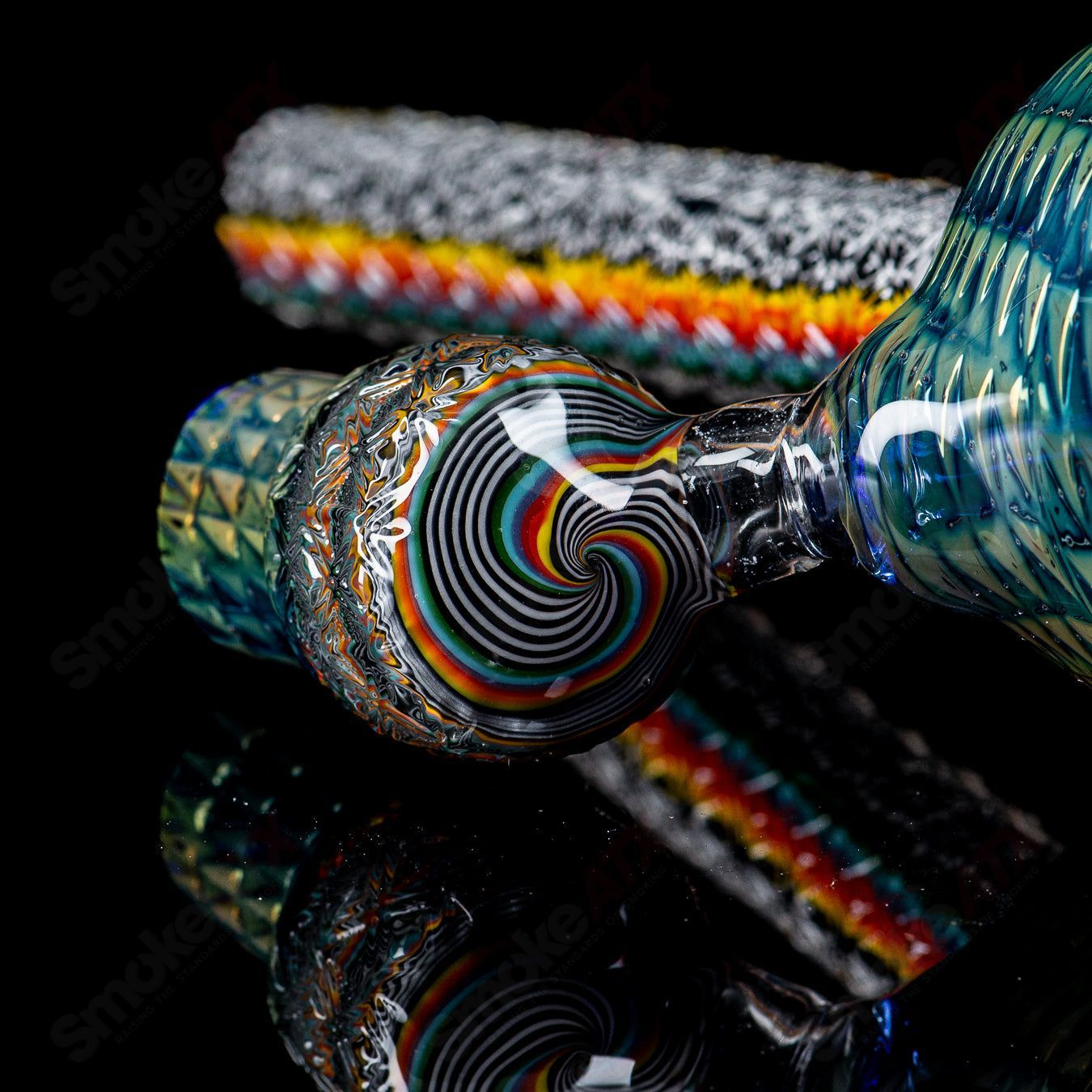 Colorful Stoke Kaleidoscope Tube Waterpipe with intricate glass patterns, showcasing artistic heady glass craftsmanship.