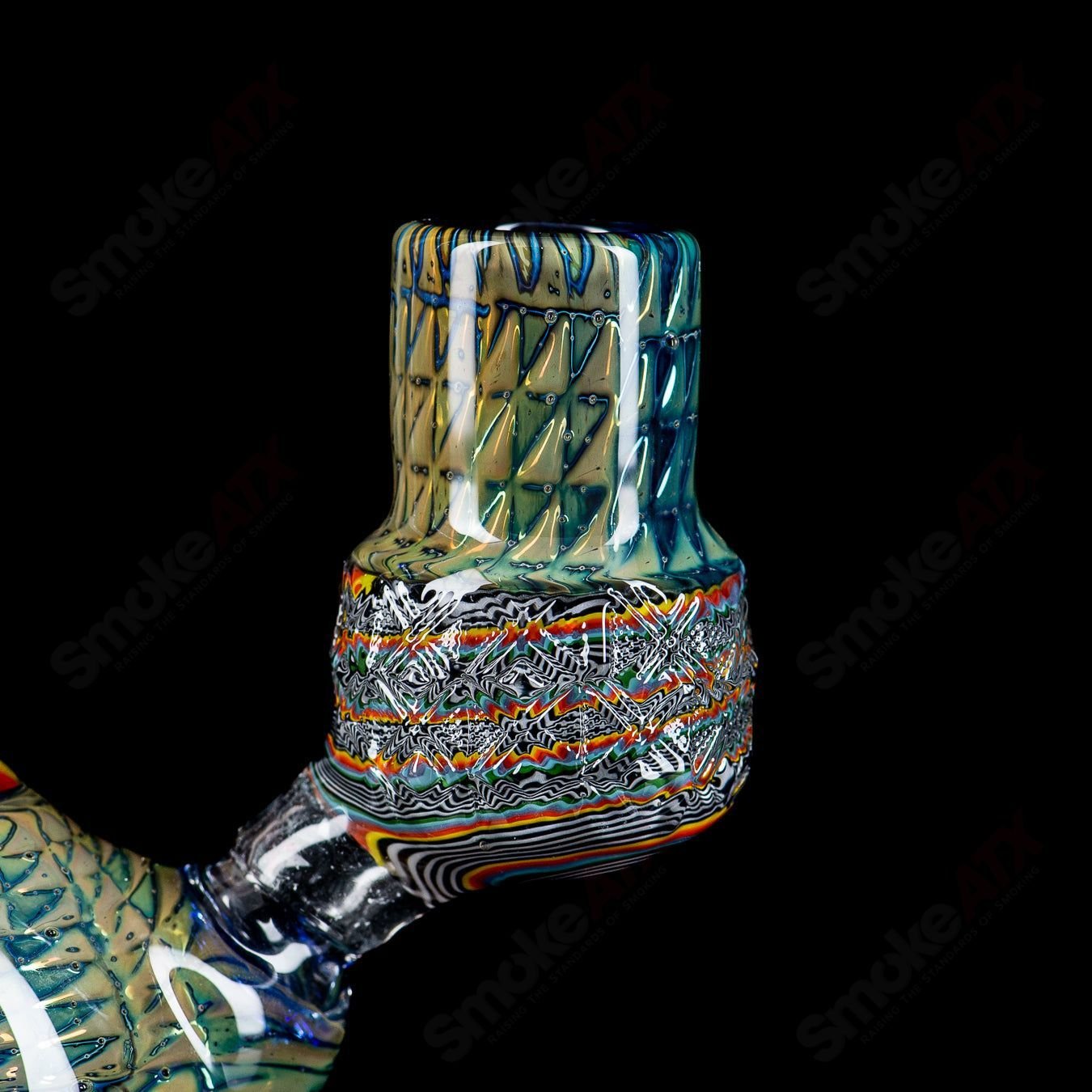 Stoke Kaleidoscope Tube Heady Glass waterpipe with colorful, intricate glass design and clear mouthpiece.