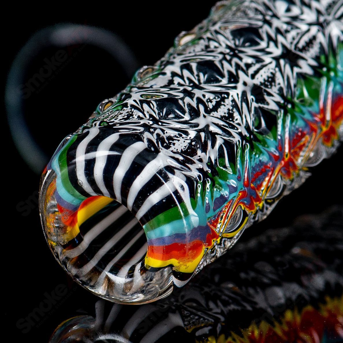 Colorful Stoke Kaleidoscope Tube waterpipe with intricate glass design, showcasing vibrant patterns and craftsmanship.