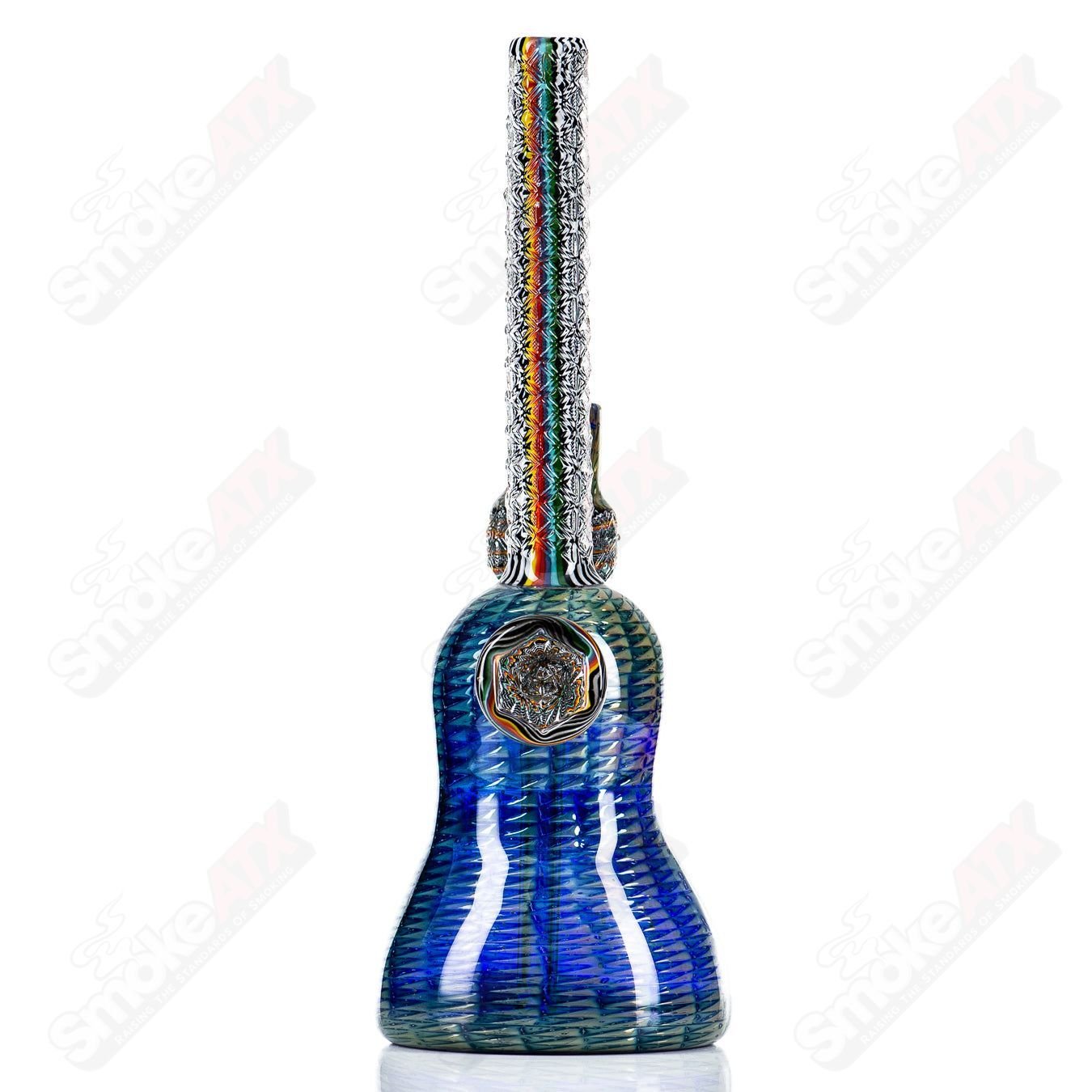 Stoke Kaleidoscope Tube Heady Glass waterpipe with vibrant, colorful glass design and intricate patterns, showcasing artistic craftsmanship.