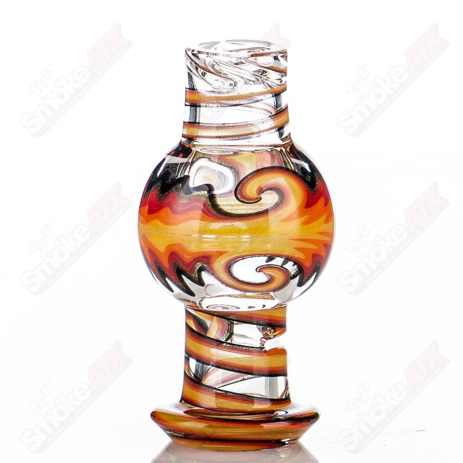 Kick Back Dewars Dumper Recycler by The Glass Carpenter, a colorful Heady Glass recycler with intricate glasswork and vibrant design.