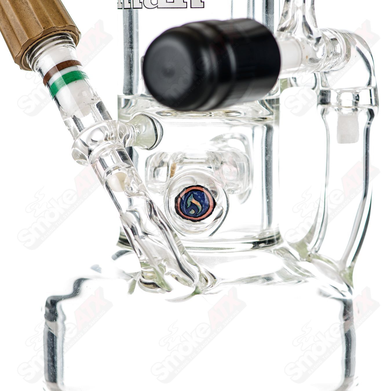 Heady glass King chess piece torch rig by Hitman Glass with straight tube design and detailed king chess piece shape.