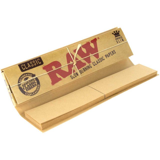 King Size Connoisseur Classic Slim RAW rolling papers with tips, featuring smooth, slim design for premium rolling experience.