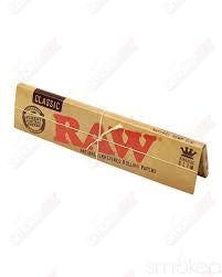 King Size Wide RAW Classic rolling papers displayed on a clean surface, showcasing their thin, natural raw paper quality.