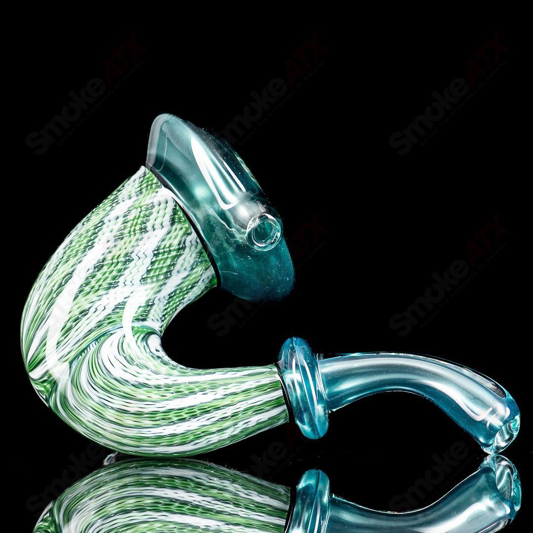 JMass Neptunium Sherlock glass pipe from Smitty & JMass collaboration, featuring a detailed Sherlock design in clear glass.