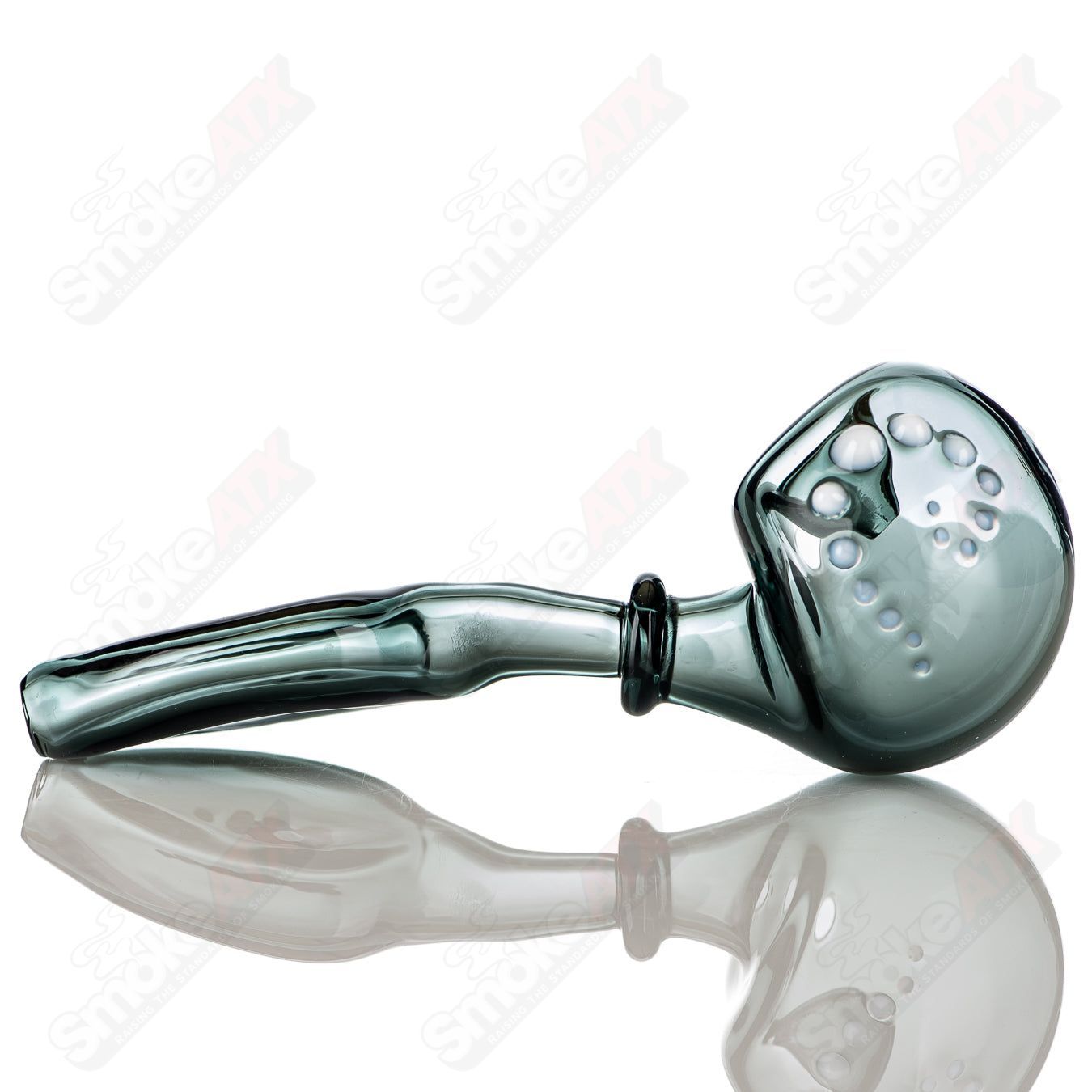 Large Smokie Layback Spoon by JMass, a hand pipe with a colorful, intricate glass design and smooth shape for easy use.