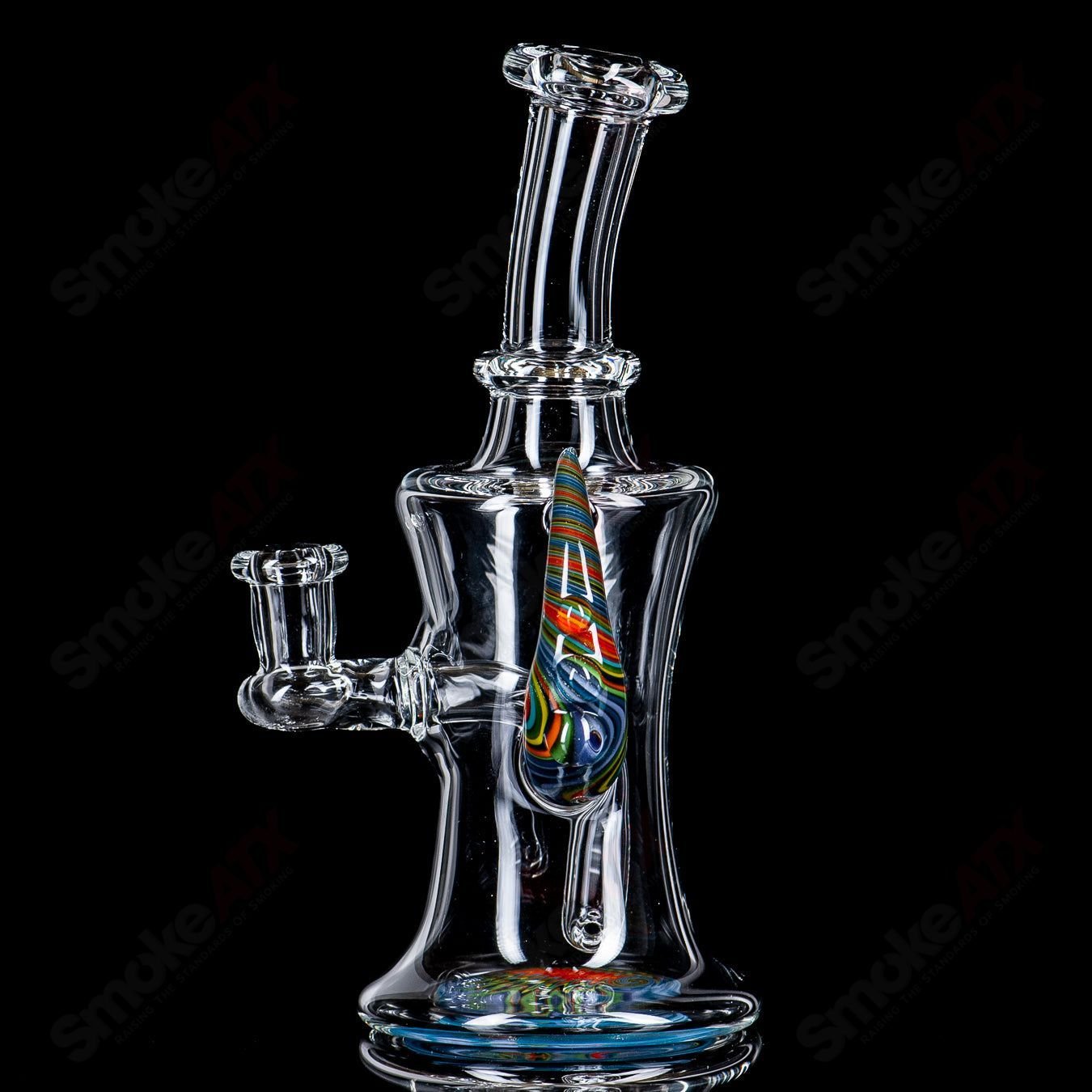 Devo Linework Rig with Horn, glass concentrate rig featuring intricate linework design and a decorative horn accent.