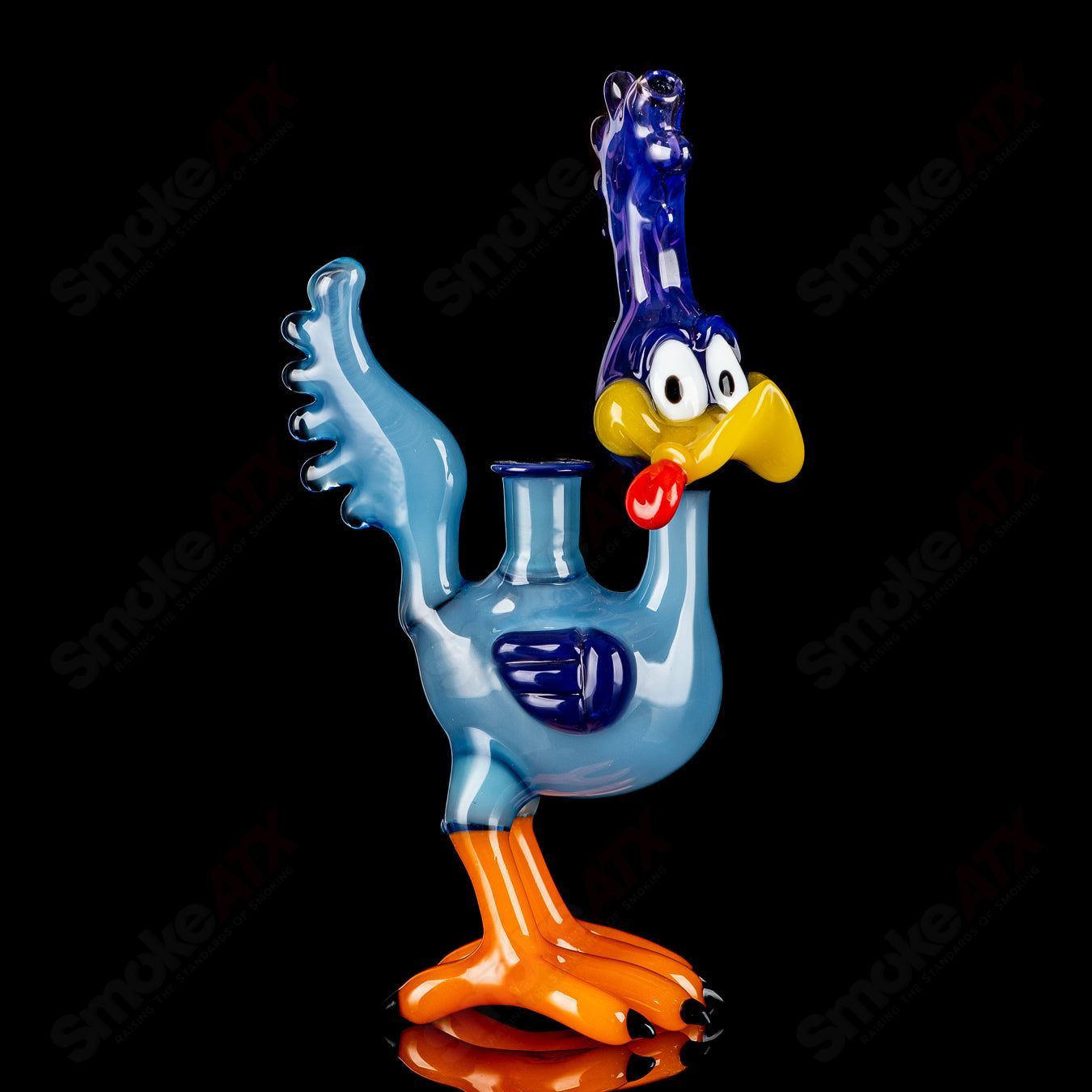 Looney Tunes Roadrunner concentrate rig by J-Smart Glass, colorful heady glass with detailed Roadrunner design and glass percolator.