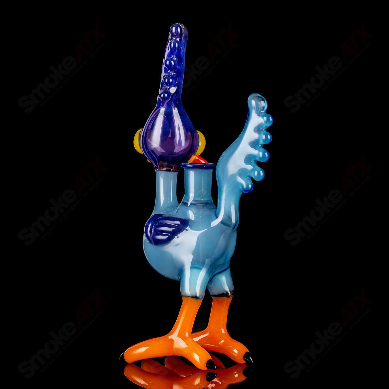 Looney Tunes Roadrunner concentrate rig by J-Smart Glass, colorful heady glass with Roadrunner design and intricate glasswork.